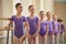 Young ballerinas standing in position.