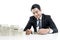 The young banker is counting banknotes on white background