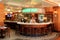 Young bartender standing behind the welcoming lights,Grand Isle Restaurant, New Orleans, 2016