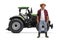 Young bearded farmer posing in front of a tractor