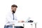 Young, bearded guy on worktable, using a laptop, looking at the screen. a man working, studying or surfing the web