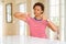 Young beautiful african american woman at home Doing thumbs up and down, disagreement and agreement expression