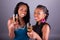 Young beautiful African womans holding a glass of champagne