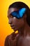 Young beautiful afro girl, vivid image with blue butterfly