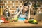 Young beautiful asian stressed woman with laptop on kitchen. Working home. In stress.