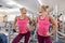 Young beautiful athletic woman blonde in gym looking in the mirror. People beauty fitness sport healthy lifestyle concept