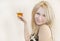 young beautiful blonde woman with wine