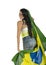 Young beautiful Brazil supporter holding up Brazil flag