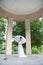 Young beautiful bride with umbrella