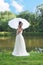 Young beautiful bride with umbrella