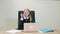 Young beautiful business woman sitting in an office workplace. Office worker.