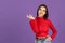 Young beautiful caucasian girl posing isolated over purple background. Thinking