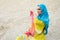 Young beautiful Caucasian woman posing in arabian costume in Empty Quarter desert