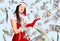 Young beautiful caucasian woman wearing santa claus costume inviting to enter smiling natural with open hand