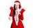 Young beautiful caucasian woman wearing santa claus costume smiling funny doing claw gesture as cat, aggressive and sexy