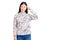 Young beautiful chinese woman wearing casual shirt smiling pointing to head with one finger, great idea or thought, good memory