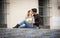 Young beautiful couple in love on street together celebrating Valentines day with Champagne toast