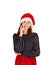 Young beautiful crazy woman in dress portrait. emotional girl in santa claus christmas hat isolated on white background. holiday c