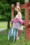 Young beautiful, elegantly dressed woman with retro bicycle. Healthy, cycling.