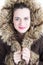 Young beautiful fashionable woman posing girl Model wearing stylish winter fake fur coat