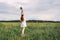 Young beautiful girl holds flowers in hands