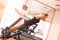 Young beautiful girl in short sport shorts and a black sleeveless jersey engaged in fitness in the gym