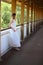 Young beautiful girl in a white dress close-up on the aqueduct bridge background