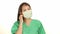 Young beautiful and happy Asian Chinese medicine doctor woman or hospital nurse in green scrubs taking out medical mask smiling