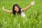 Young beautiful and happy Asian Chinese tourist girl having fun feeling free at tropical rice field enjoying exotic holidays trip