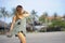 Young beautiful and happy Asian woman smiling relaxed having fun on tropical beach in Bali Asia