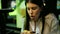 Young beautiful hispanic woman eating delicious hamburger at the restaurant