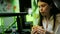 Young beautiful hispanic woman eating delicious hamburger at the restaurant