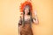 Young beautiful latin girl wearing indian costume smiling positive doing ok sign with hand and fingers