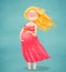 Young beautiful pregnant blonde woman in pink dress on blue background