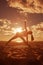 Young beautiful slim woman silhouette practices yoga on the beach at sunset. Yoga at sunrise