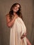 Young beautiful smiling pregnant woman. Happy Maternity concept