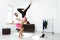 Young beautiful sportive couple training yoga asanas at home.