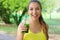 Young beautiful sporty woman drinking green detox smoothie. Fitness girl drinking vegetable smoothie after fitness running workout