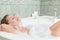 Young beautiful woman in a bath