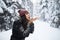 Young Beautiful Woman Blow Snow Hands In Winter Forest Girl Outdoors Walking Snowy White Park