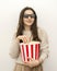 a young beautiful woman brunette with a popcorn