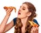 Young beautiful woman eating big pizza.