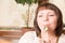 Young beautiful woman eating a dessert. Sweet life with cake