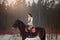 Young beautiful woman with horse outdoor portrait at spring day