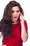 Young beautiful woman irritated on the phone