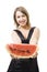 Young beautiful woman offer piece of watermelon