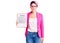 Young beautiful woman with pink hair holding clipboard with contract document with a happy and cool smile on face