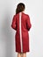 Young beautiful woman posing in new dark red fashion winter dress coat back view