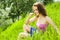 Young beautiful woman reverie in grass