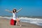 Young beautiful woman during seaside vacation.